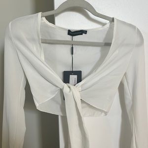White crepe tie front crop with bell sleeve